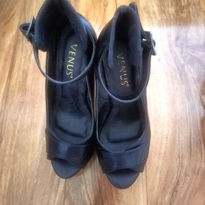 Black high heels w/ ankle strap sexy 5 inch stilleto heels.  Size 6.